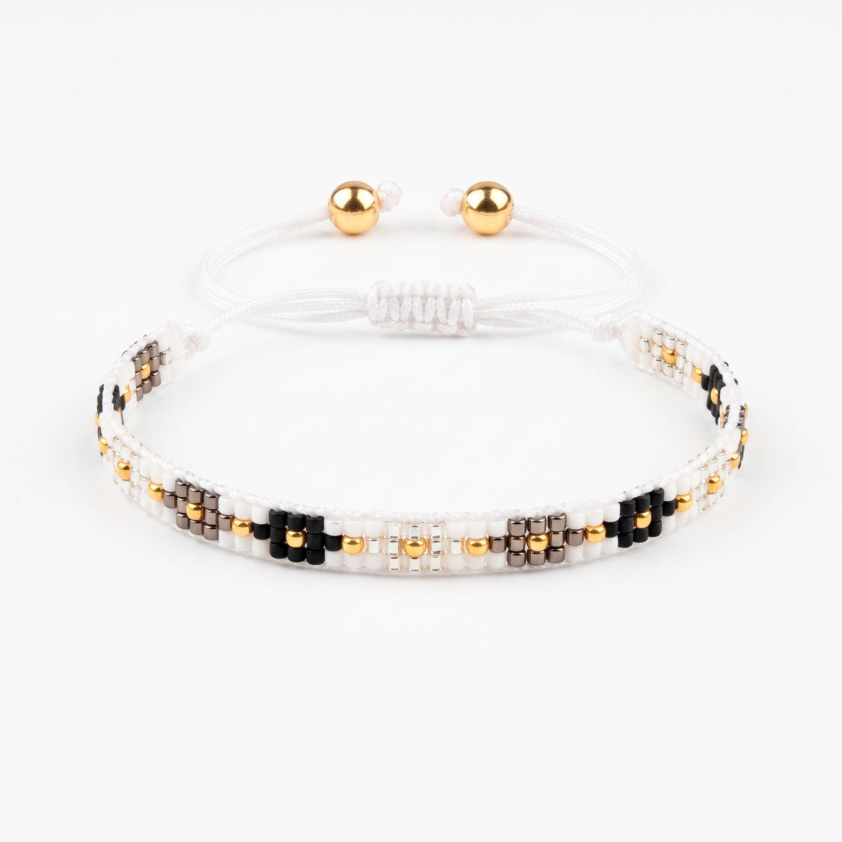 Pulsera Triple Flores - Cuatro a Mano